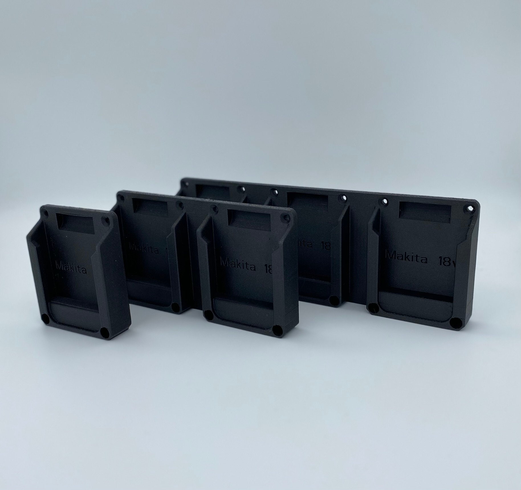 il_fullxfull.5600246852_59mm.jpg Makita 18V Battery Holder – Wall Mount Organizer - Image 1