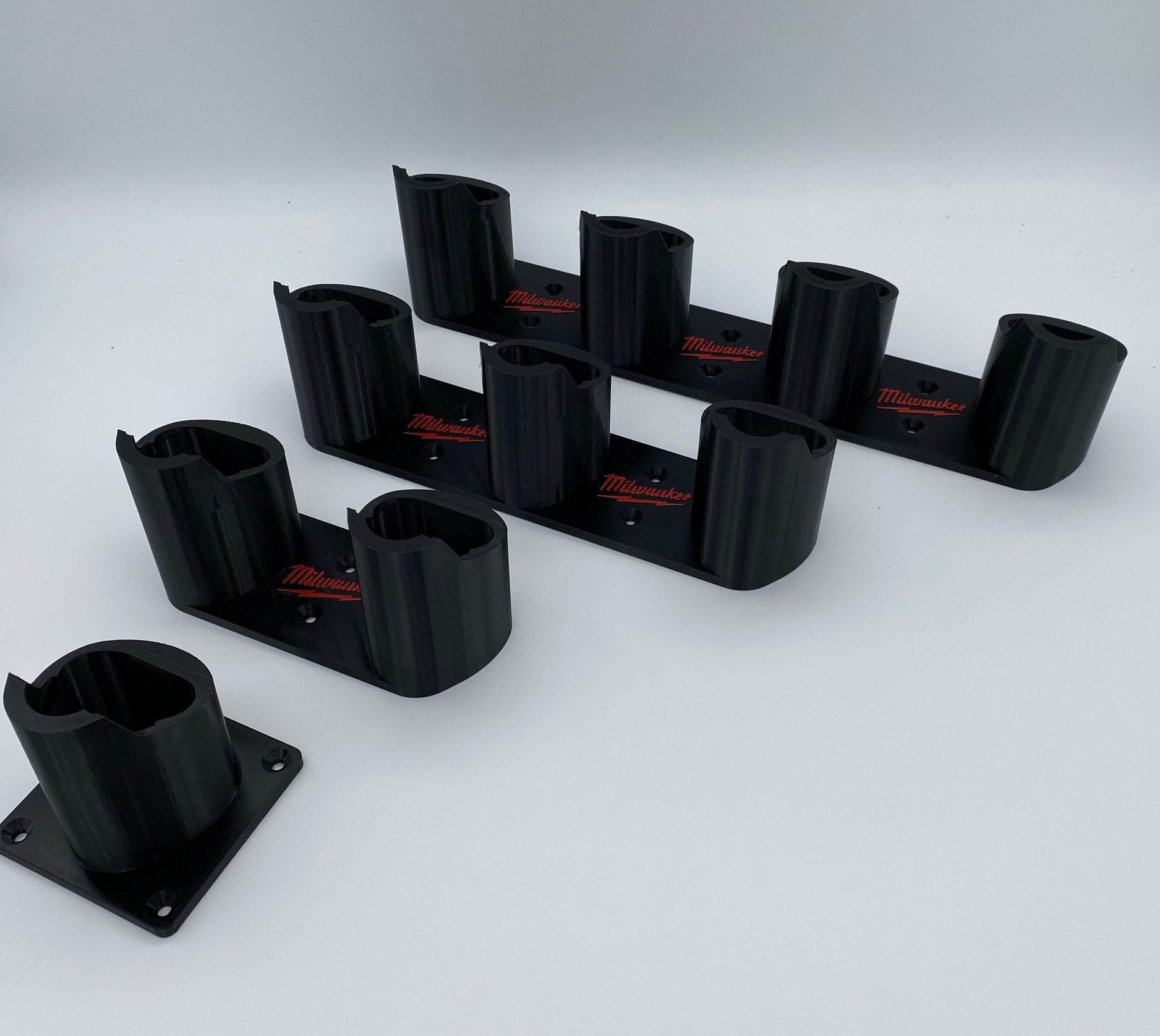 il_fullxfull.5750714109_i39r.jpg Milwaukee M12 Battery Holder Wall Mount | Self-Locking Tool Organizer - Image 1